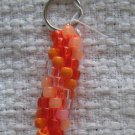 Hand Crocheted Pony Bead Keychain (item # JK0011) - Oranges and glow-in-the-dark