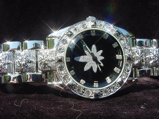 Paved Marijuana - black background Watch