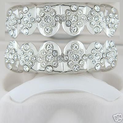 Blingin star rhodium plated playa top and bottom grillz set