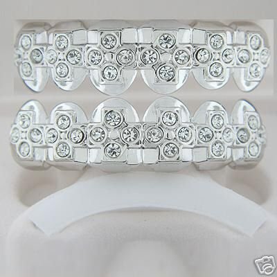 Cross of bling rhodium plated playa top and bottom grillz set