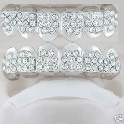 Forty-eight points of ice rhodium plated playa top and bottom grillz set