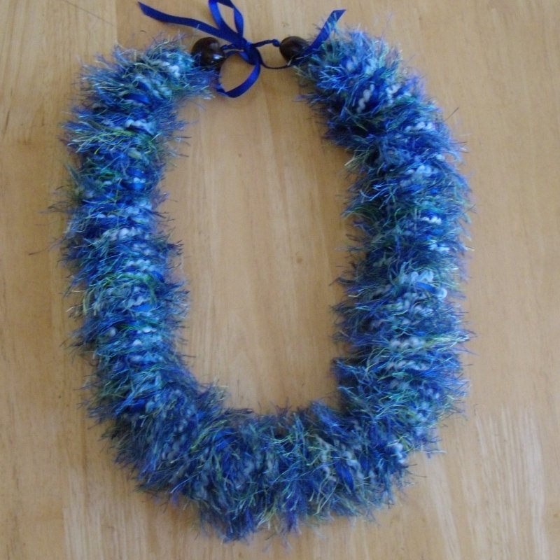 Hawaiian crochet lei w/ blue green eyelash yarn ribbon kukui nut