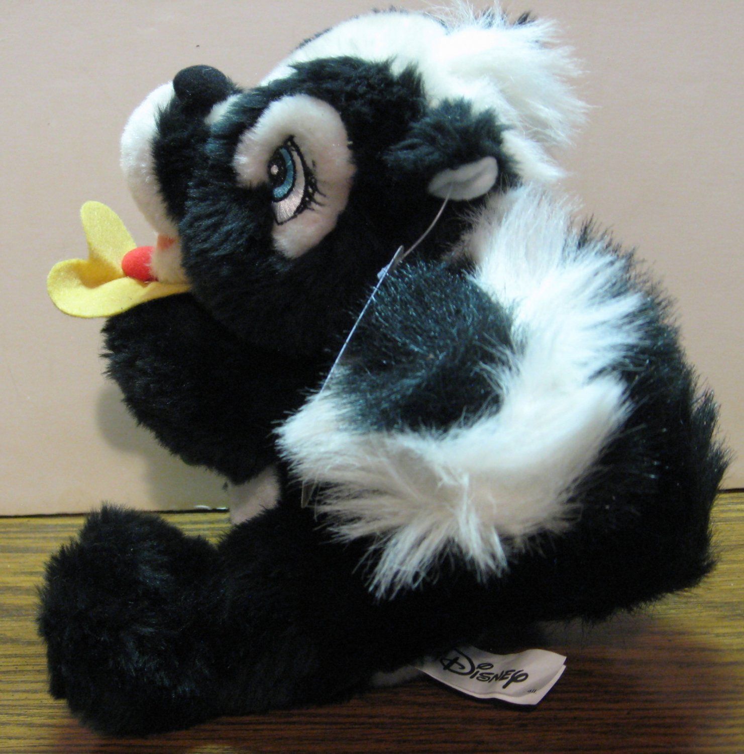 flower the skunk stuffed animal