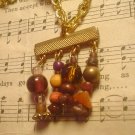 Handmade goldtone four dangle necklace