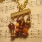 Handmade goldtone four dangle necklace