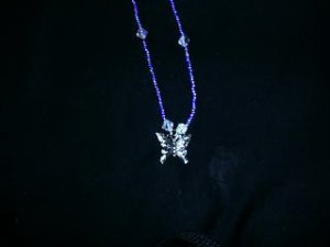1 dozen assorted 20" glass beaded necklaces with a butterfly charm