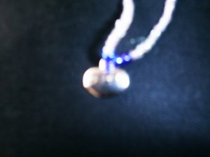 1 dozen assorted 20" glass beaded necklaces with "peace" charm