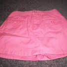 A  pair of Peach Faded Glory Skorts 3T