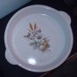A Pie Plate made by Blue Mountain Pottery Country Charm Pattern