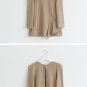Beige formfitted unique zipper detail top