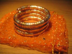 Tri-color (gold/silver/copper) spiral coil bangle