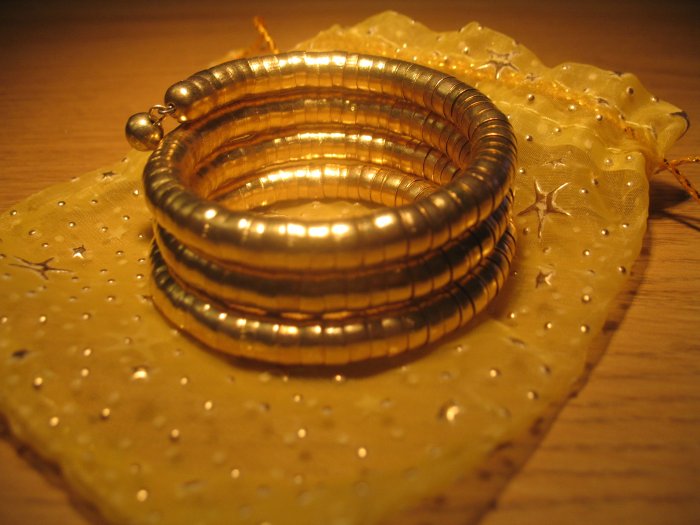 Gold spiral coil metal bangle