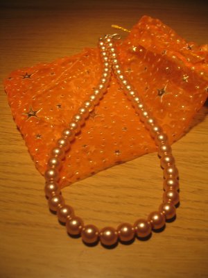 String of light brown faux pearls