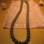 String of dark gray faux pearls