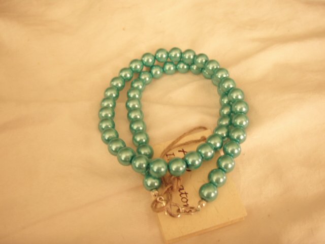 String of mint green faux pearls