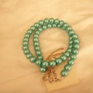 String of mint green faux pearls