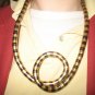Twist metal necklace in gold and pewter