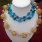 Gold tone wire 9 ball necklace