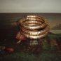 Gold spiral coil metal bangle