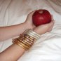 Tri-color (gold/silver/copper) spiral coil bangle