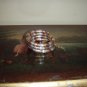 Tri-color (gold/silver/copper) spiral coil bangle