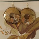Gold tone dimpled disk earrings