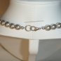 String of silver faux pearls