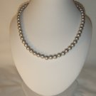String of silver faux pearls