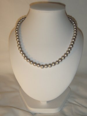 String of silver faux pearls