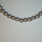 String of silver faux pearls