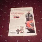 Champion Spark Plugs ad featuring Tom McCahill