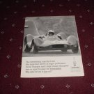 1963 Champion Spark Plugs ad with Roger Penske
