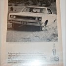 1967 Champion ad featuring American Motors Rebel SST 2 dr ht
