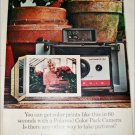1965 Polaroid Land Automatic 104 Camera Woman and Flowers ad