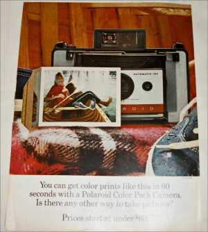 1966 Polaroid Land Automatic 104 Camera Girl in Canoe ad