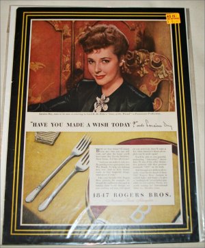 1847 Rogers Brothers Silverware ad featuring Laraine  Day
