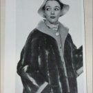 1952 Bradley's Ringtail Opossom and Oatmeal Cloth Coat ad from the UK