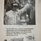 1974 Champion Spark Plugs ad featuring Johnny Rutherford