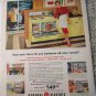 1959 GE Family Size Electric Rotisserie Oven ad