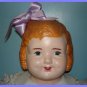 Antique Composition Bow Doll from the 1920s