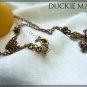 BRAND NEW Gothic Bronze Crystal and Rhinestone Cross Necklace