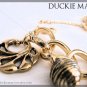 BRAND NEW Rocawear Multi Charm Chucky Bracelet