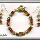 ONE OF A KIND ORIGINAL AUSTRIAN CRYSTAL IN GOLD TONE BRACELET & EARRINGS (B-1113)