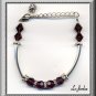 BRACELET IN  DARK PURPLE CRYSTAL & SILVER TONE COMPONENETS (B-1122)