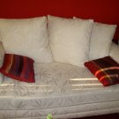 Cream colored, jacquard textured sofa
