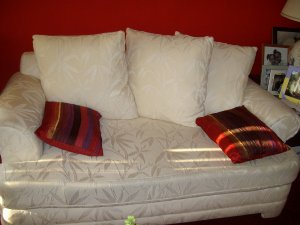 Cream colored, jacquard textured sofa