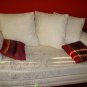 Cream colored, jacquard textured sofa