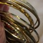Brass bangle bunch. All. 12