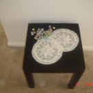 A pair of cute crochet doilies