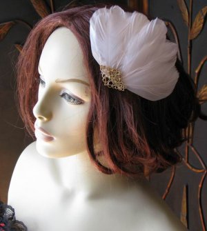 Feathers fascinator Gold
